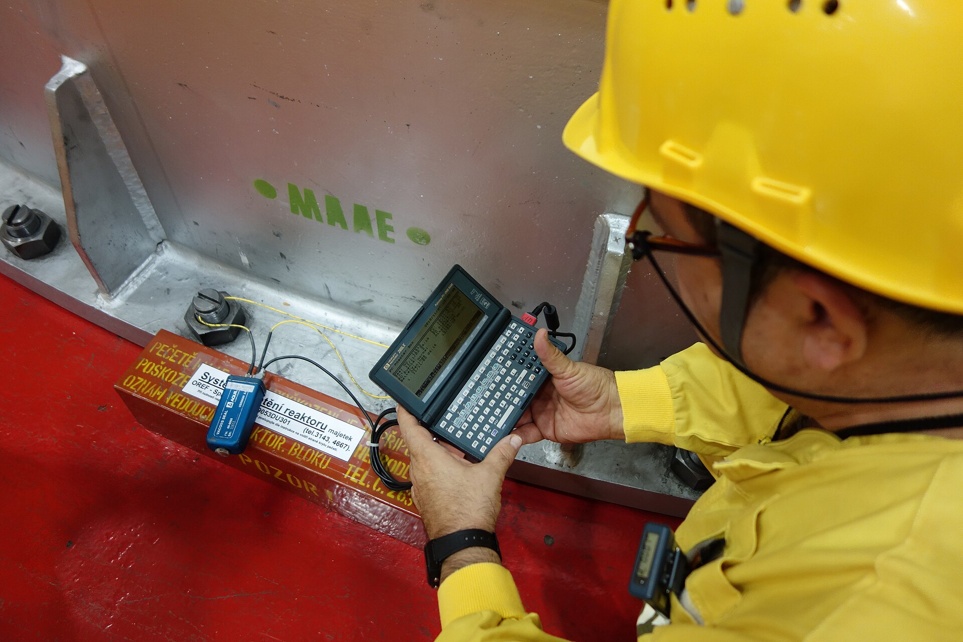 IAEA inspector verifying reactor-core seals at Dukovany Nuclear Power Plant, Czech Republic, 6 November 2012.